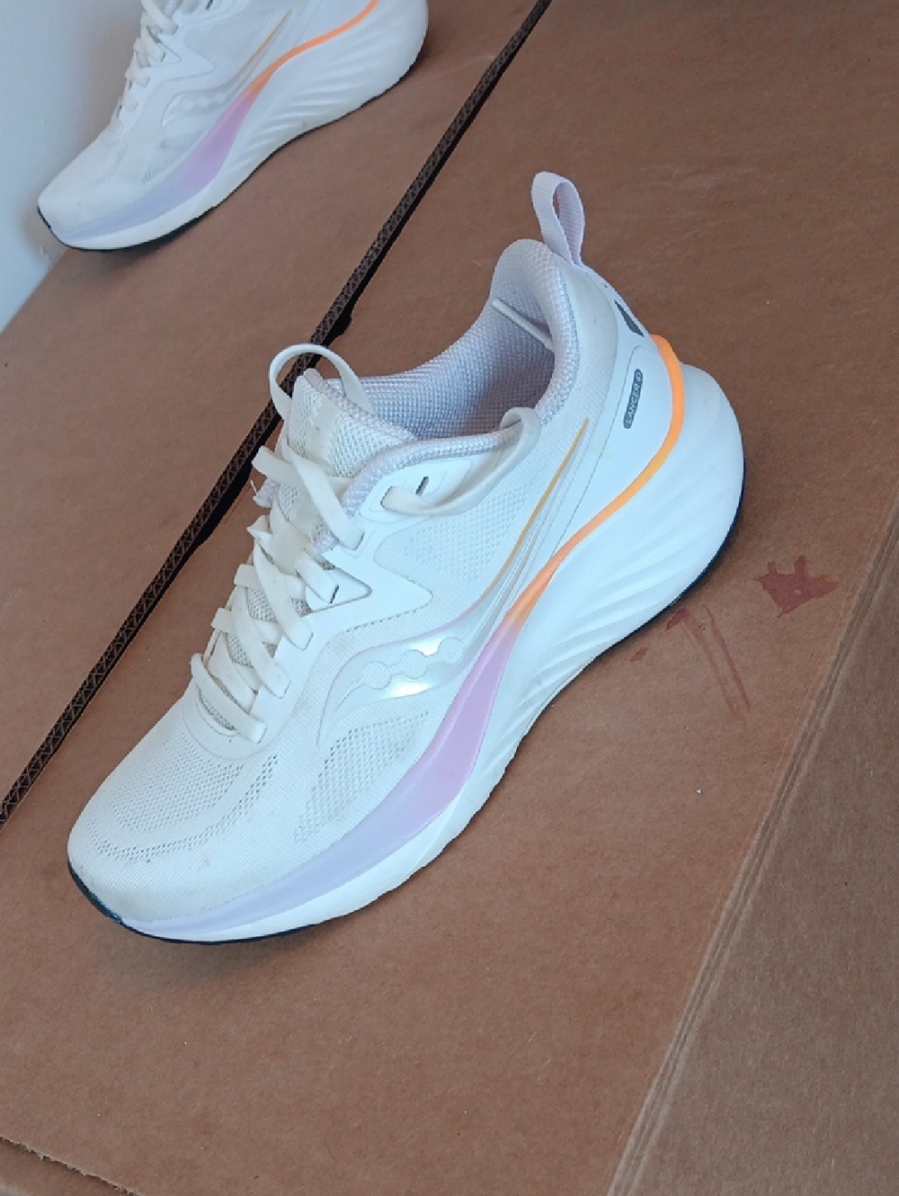 Saucony Women’s White Running Shoes with Pink and Orange Accents